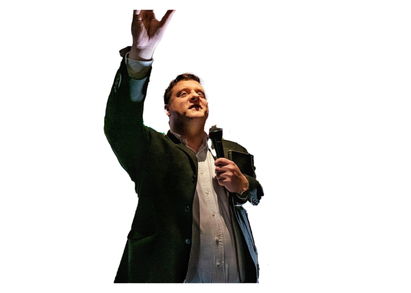 Stephen Ryan performing stand-up comedy with characteristic charm